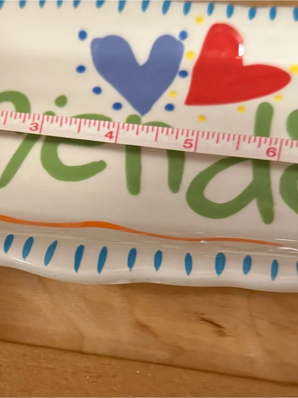 Ceramic trinket tray by Coton Colors Express that says Friends